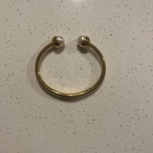 Gold and pearl Tory Burch bracelet